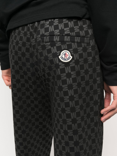 Shop Moncler Monogram-print Track Pants In Black