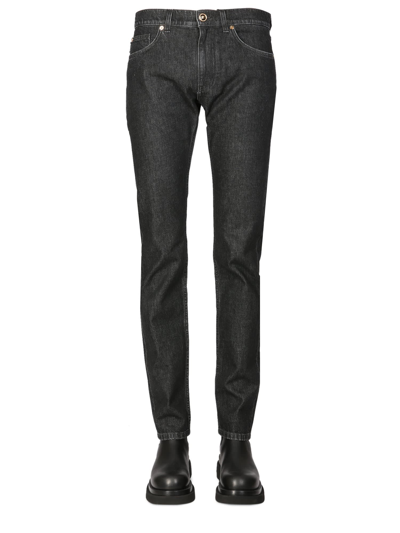Shop Versace Slim Fit Jeans In Nero