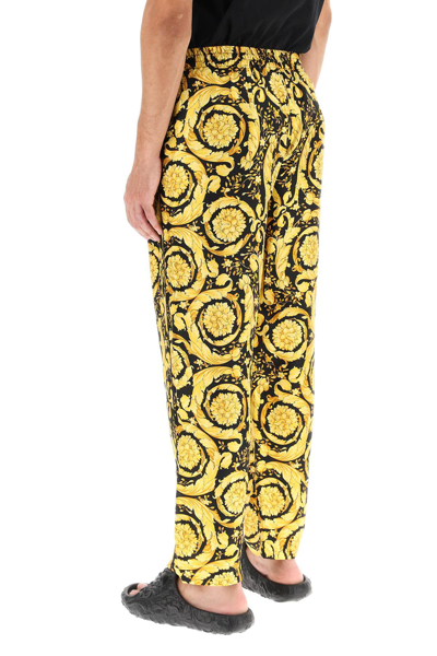 Shop Versace 'barocco' Silk Pajamas Pants In Gold,black