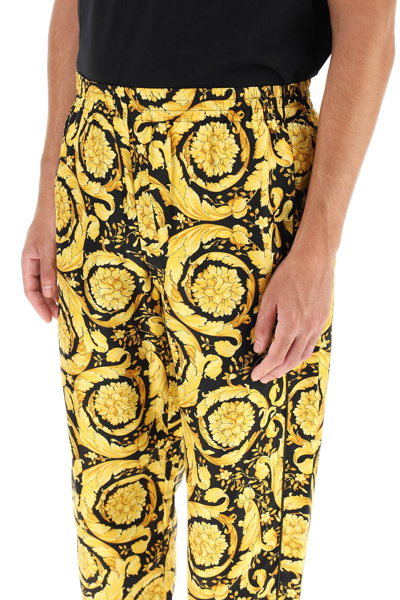 Shop Versace 'barocco' Silk Pajamas Pants In Gold,black