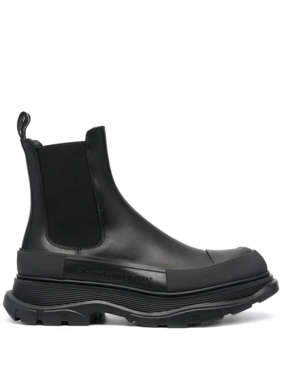 Shop Alexander Mcqueen Tread Slick Ankle Boots In Black