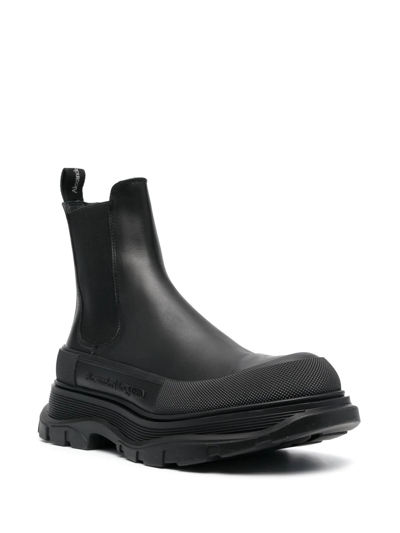 Shop Alexander Mcqueen Tread Slick Ankle Boots In Black