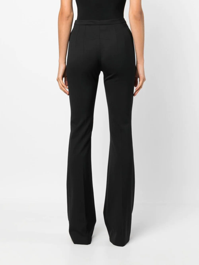 Patou Pleated Wool-blend Twill Flared Pants In Black