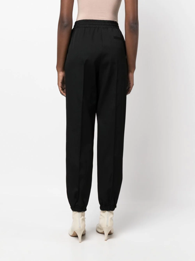 Jil Sander Wool-gabardine Tapered Track Pants In 001