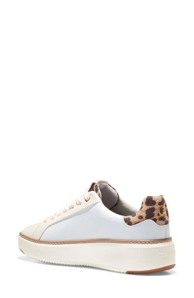 Shop Cole Haan Grandpro Topspin Sneaker In White/ Ivory