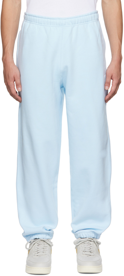 Shop Nike Blue Solo Swoosh Lounge Pants In Celestine Blue/white