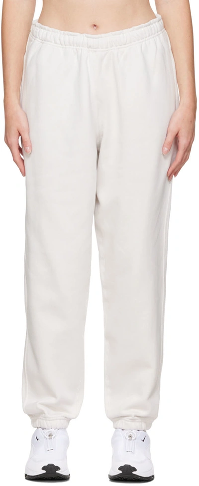 Shop Nike White Solo Swoosh Lounge Pants In Phantom/white