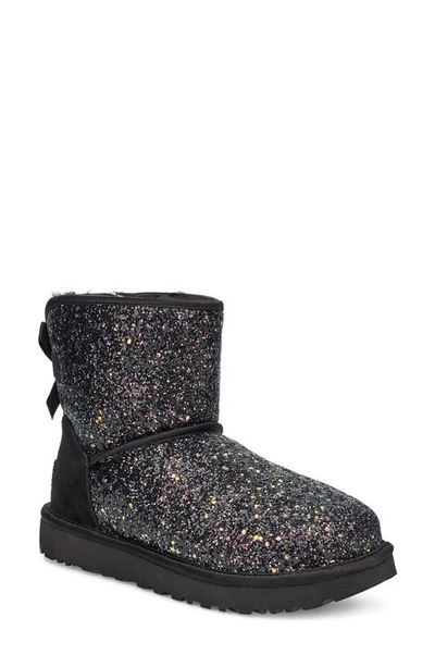 Shop Ugg Classic Cosmos Bow Mini Bootie In Black