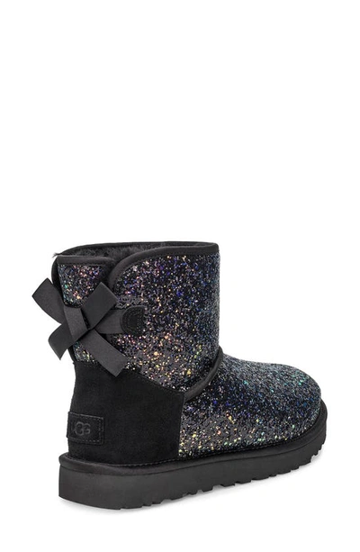 Shop Ugg Classic Cosmos Bow Mini Bootie In Black