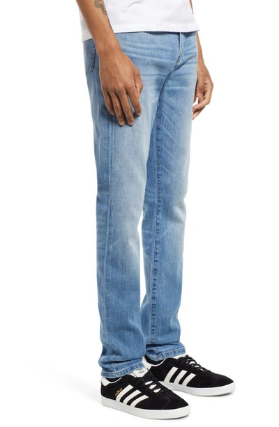 Shop Frame L'homme Skinny Fit Jeans In Vintage Wash Light