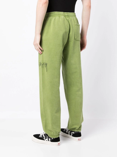 Shop Stussy Logo-print Cotton Track Pants In Green