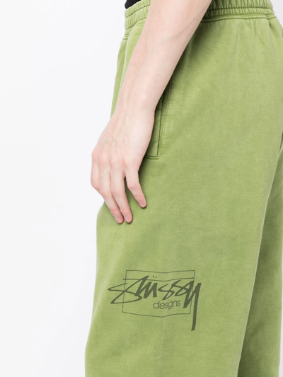 Shop Stussy Logo-print Cotton Track Pants In Green