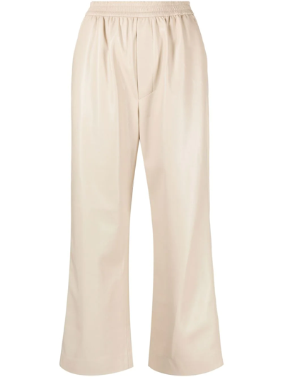 Shop Nanushka Faux-leather Cropped Trousers In Neutrals