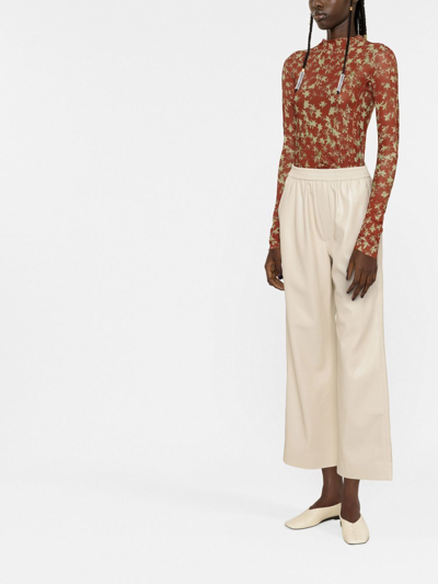 Shop Nanushka Faux-leather Cropped Trousers In Neutrals