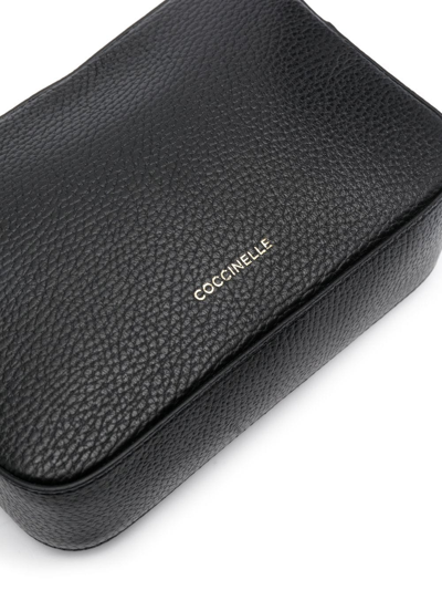 Coccinelle Tebe Logo-strap Pebbled Shoulder Bag In Black