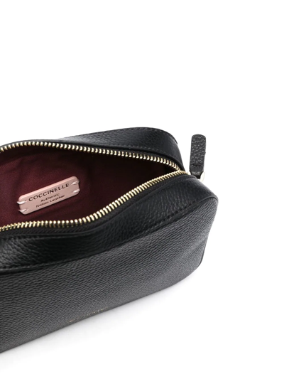 Coccinelle Tebe Logo-strap Pebbled Shoulder Bag In Black