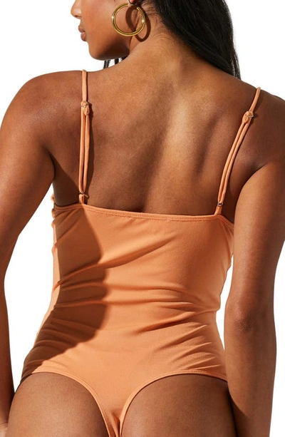 Shop Astr The Label Twist Bust Bodysuit In Peach