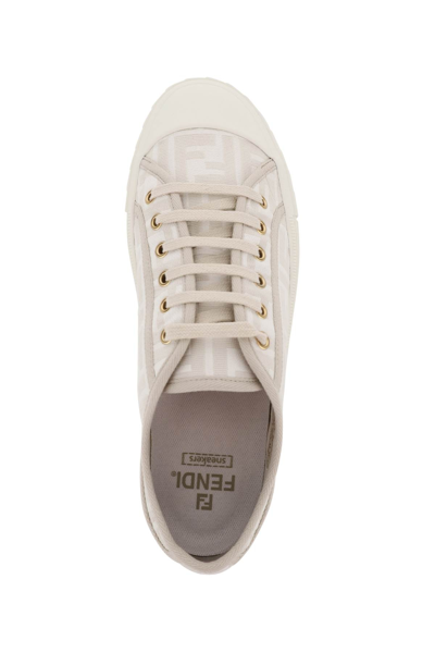 Shop Fendi Domino Sneakers In White,beige