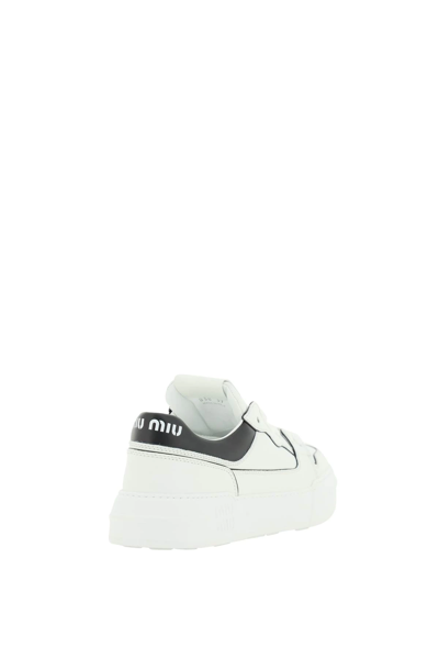 Shop Miu Miu Leather Sneakers In White
