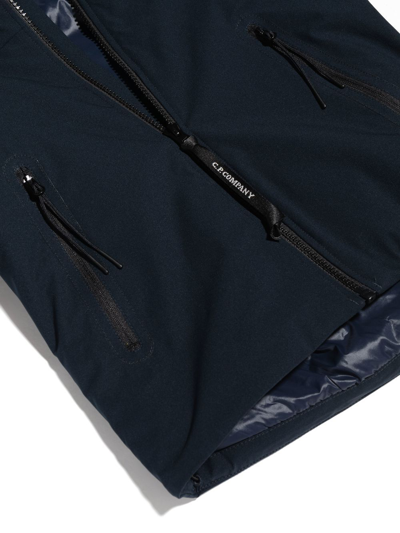 Shop C.p. Company Lens Detail Zipped Rain Jacket In Blue