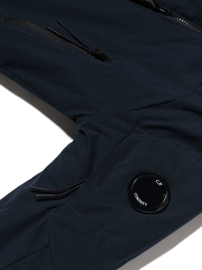 Shop C.p. Company Lens Detail Zipped Rain Jacket In Blue
