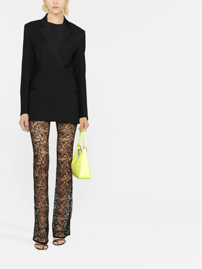 Shop Saint Laurent Straight-leg Floral Lace Trousers In Schwarz