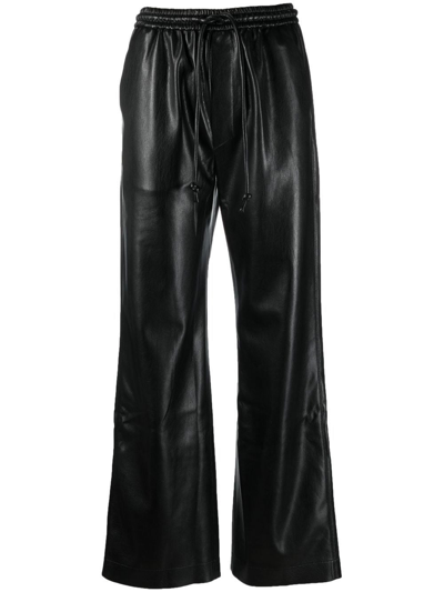 Shop Nanushka `calie` Eco Vegan Leather Pants In Nero