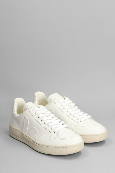 Shop Veja V-12 Sneakers In White Leather