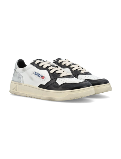 Shop Autry Medalist Low Super Vintage Sneakers In White Silver Black