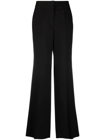 Shop Stella Mccartney Wool Flared Trousers In Schwarz