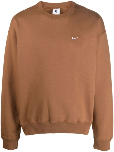 Shop Nike Solo Swoosh Crewneck Sweatshirt In Braun