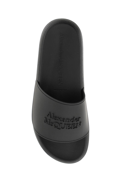 Shop Alexander Mcqueen Logoed Rubber Slides In Black