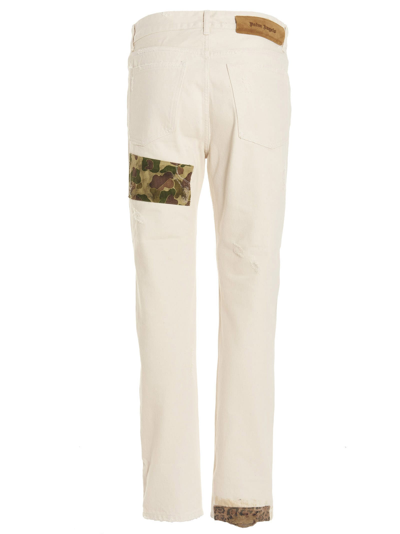 Shop Palm Angels Patches Jeans In White