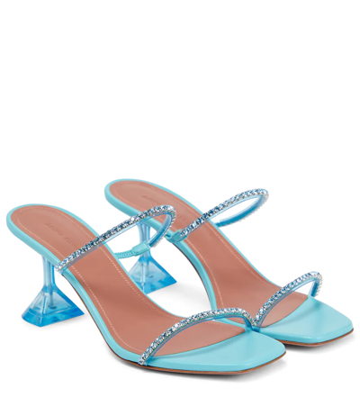 Shop Amina Muaddi Gilda Embellished Pvc Mules In Aqua Blue