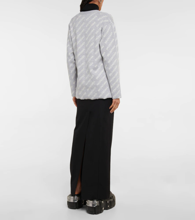 Shop Balenciaga Mini Allover Logo Knit Cardigan In Taupe/brown
