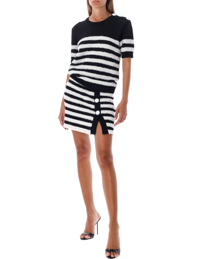 Shop Balmain Knit Mini Skirt In Black White