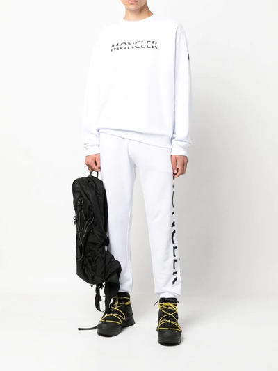 Shop Moncler Logo Patch Track Pants In Weiss