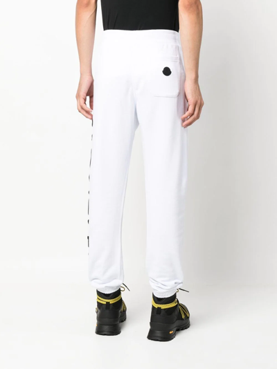 Shop Moncler Logo Patch Track Pants In Weiss