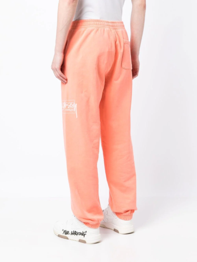 Shop Stussy Logo-print Track Pants In Orange
