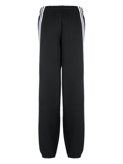 Shop Adidas Originals Logo-patch Slip-on Track Pants In Schwarz