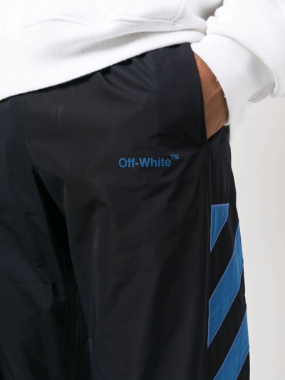 Shop Off-white Logo Print Track Pants In Blau