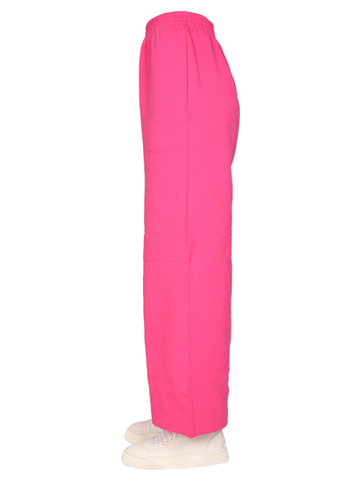 Shop Mcq By Alexander Mcqueen Wide Leg Jogging Pants In Fucsia