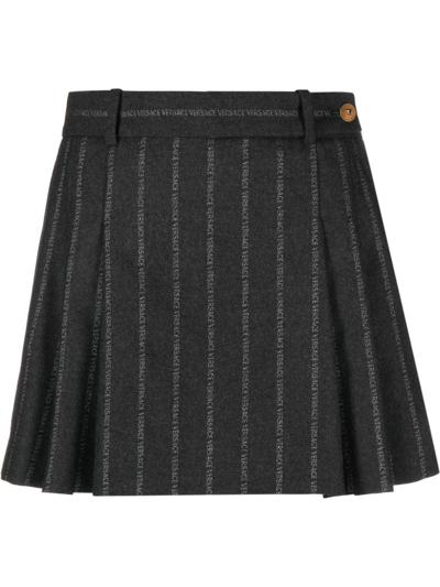 Versace Logo Pleated Pinstripe Wool Mini Skirt In Grey