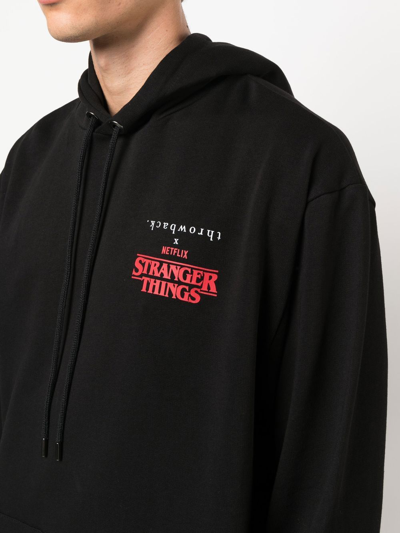 Shop Throwback Stranger Things Graphic-print Hoodie In Black