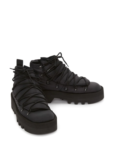 Shop Jw Anderson Padded Lace-up Boots In Black