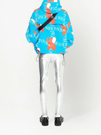 Jw Anderson All Over Logo Print Nylon Zip Jacket In Blue