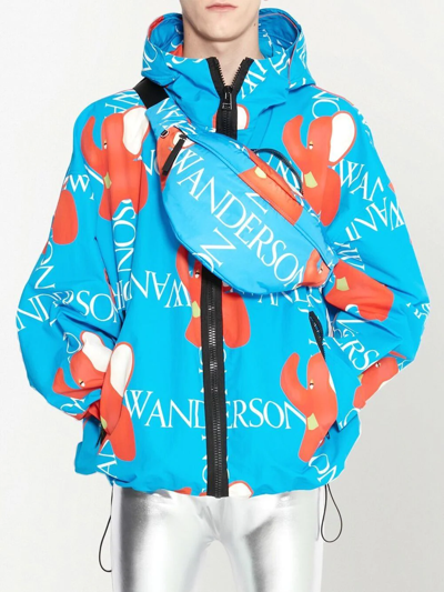 Jw Anderson All Over Logo Print Nylon Zip Jacket In Blue