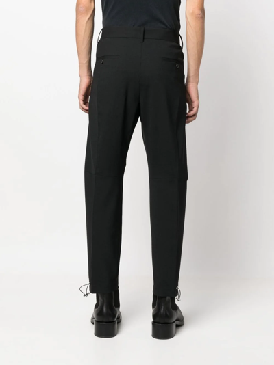 DSQUARED2 TOGGLE-ANKLE TAPERED TROUSERS 