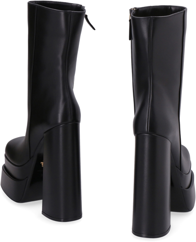 Shop Versace Aevitas Leather Wedge Ankle Boots In Black