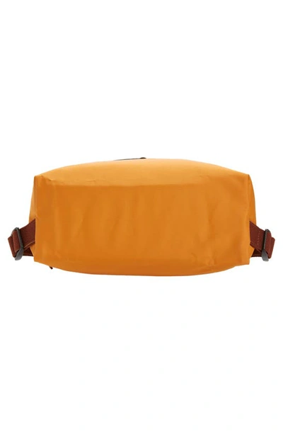 Shop Longchamp Le Pliage Backpack In Saffron